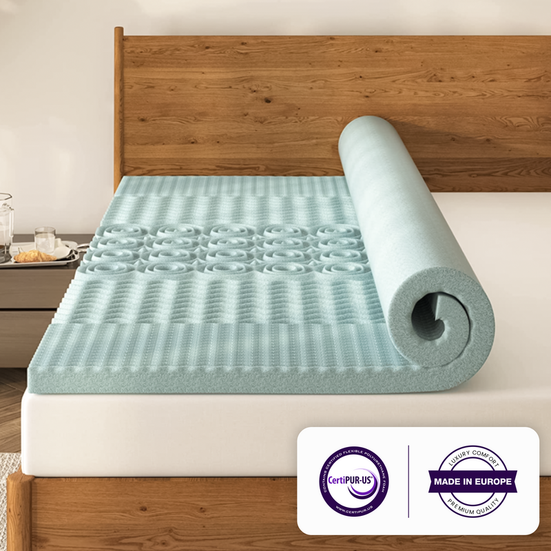 a mattress topper on a bed