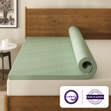 a mattress topper on a bed