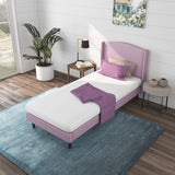 a bed with a pink kids mattress in a room