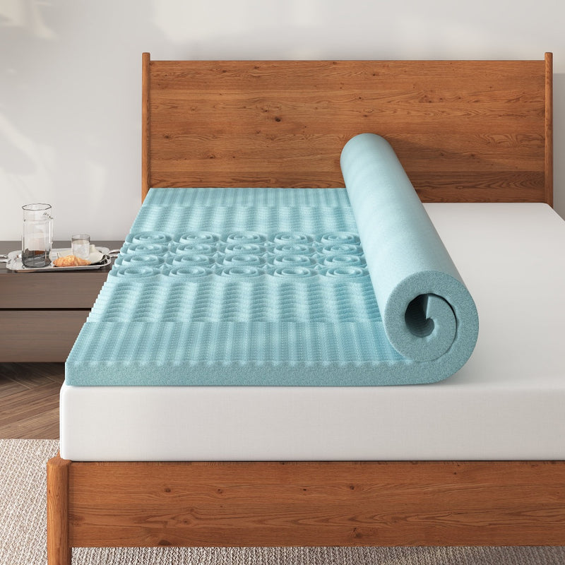 a mattress topper on a bed